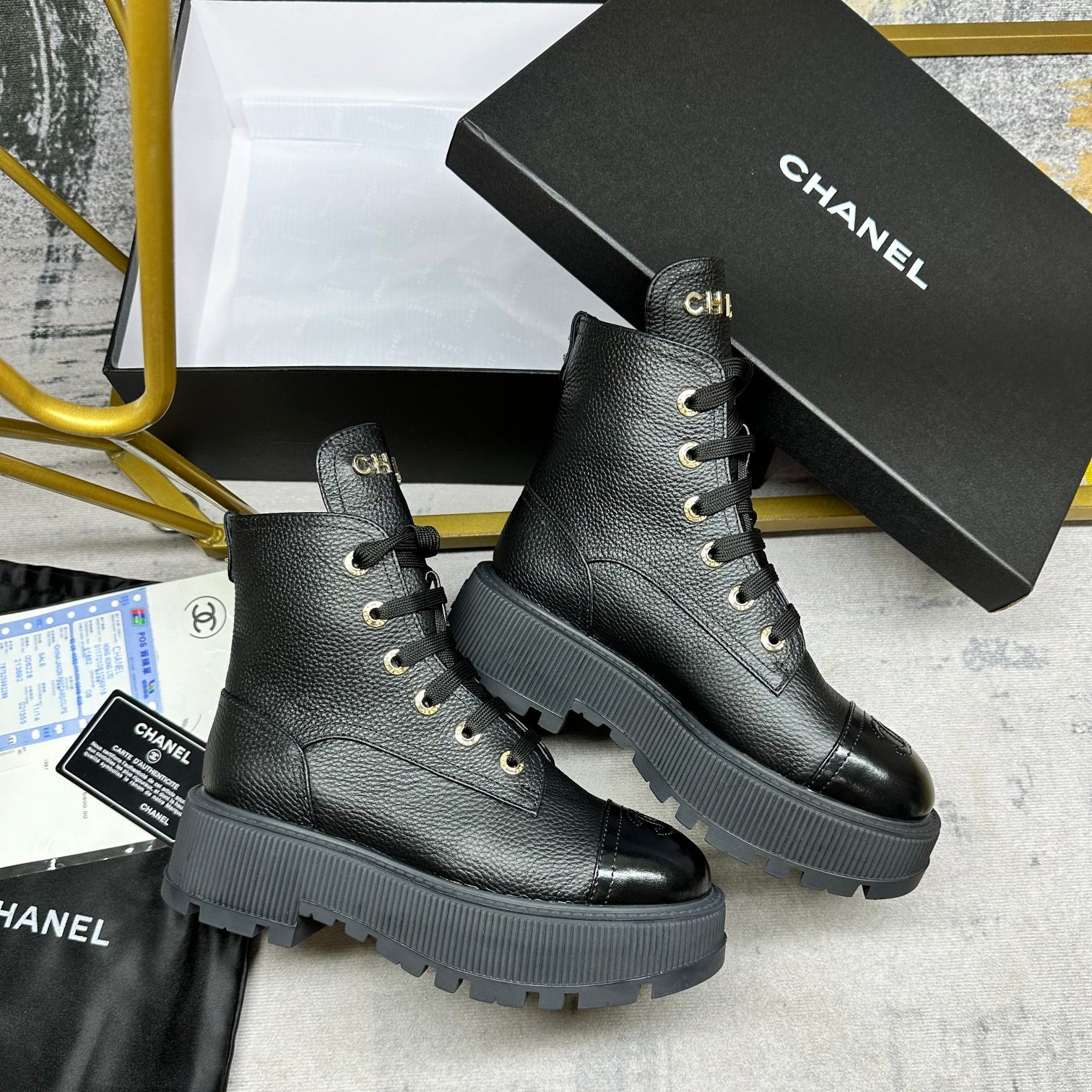 Chanel black leather boots